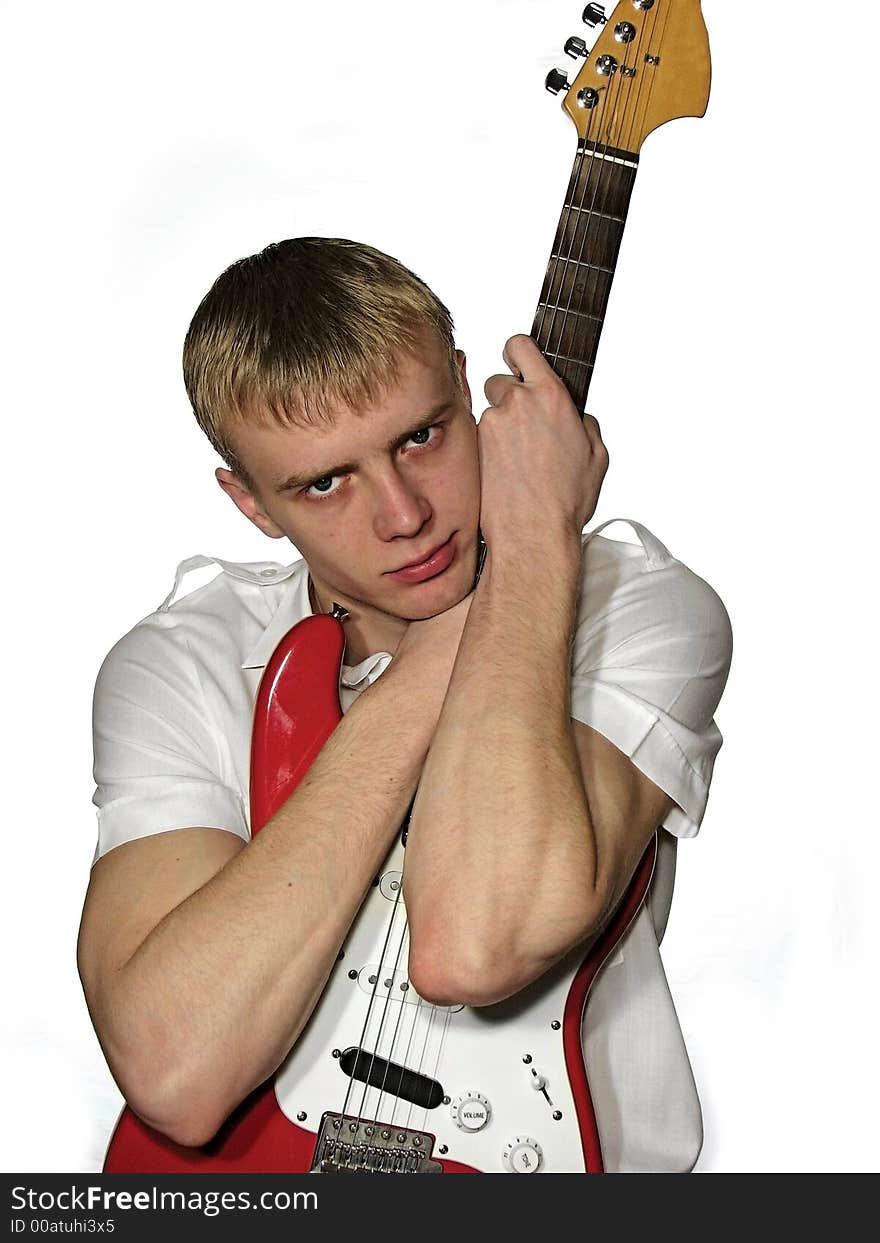 Guy blonde with a red guitar. Guy blonde with a red guitar