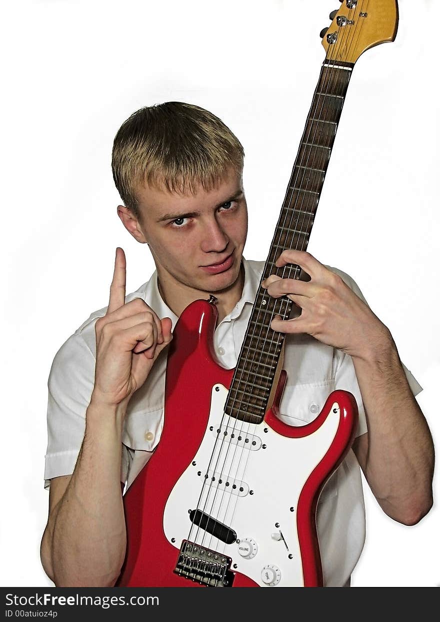 Guy blonde with a red guitar fender. Guy blonde with a red guitar fender