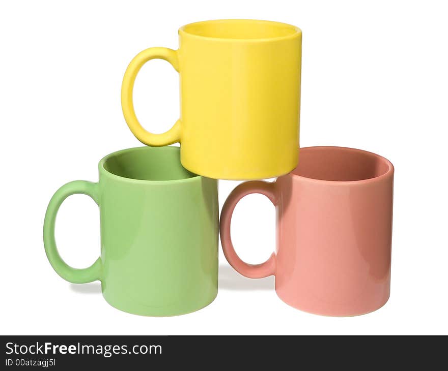 Three colorful mugs, isolated on white