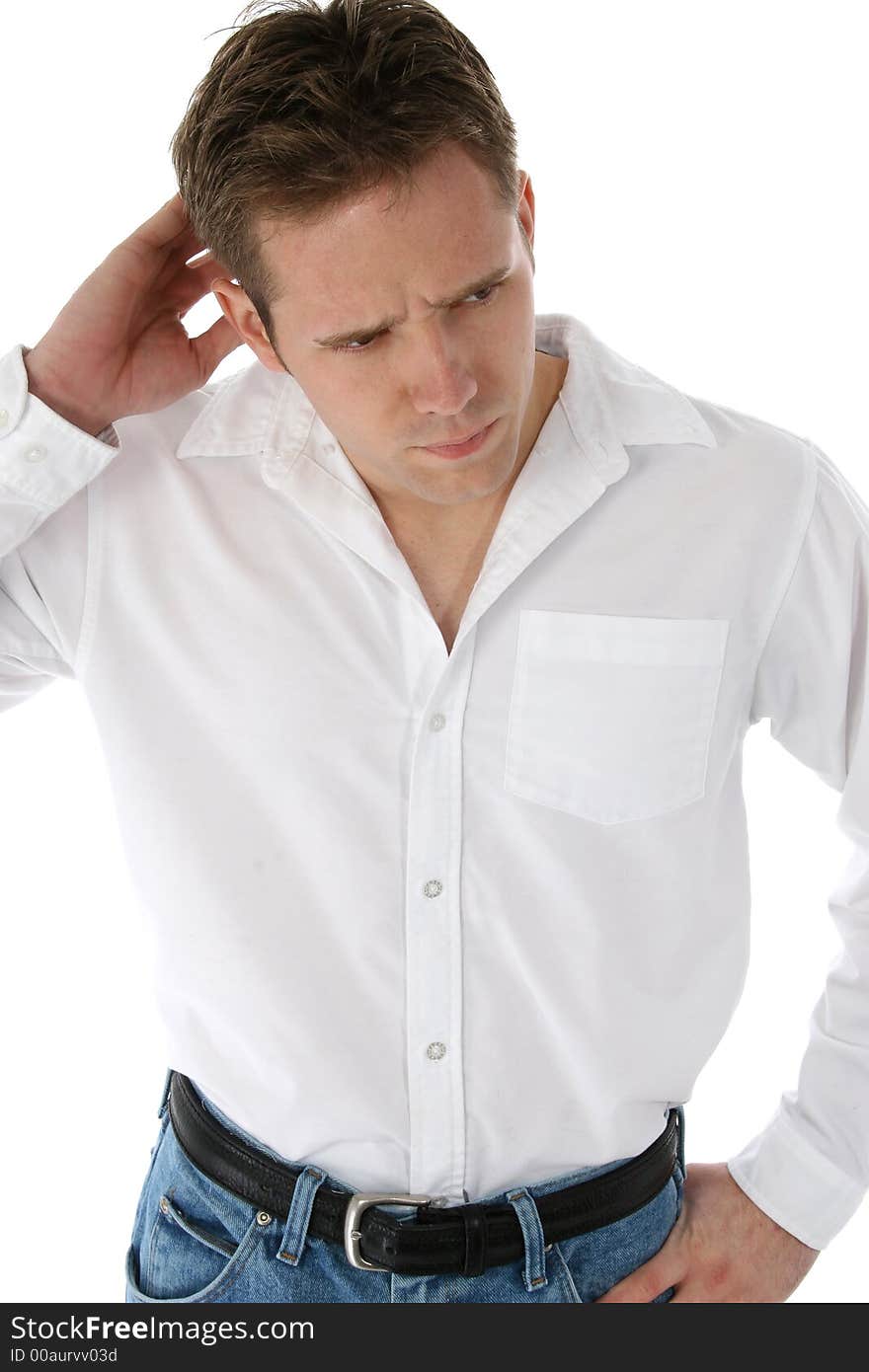 Attractive twenty something man in white and denim. Attractive twenty something man in white and denim.