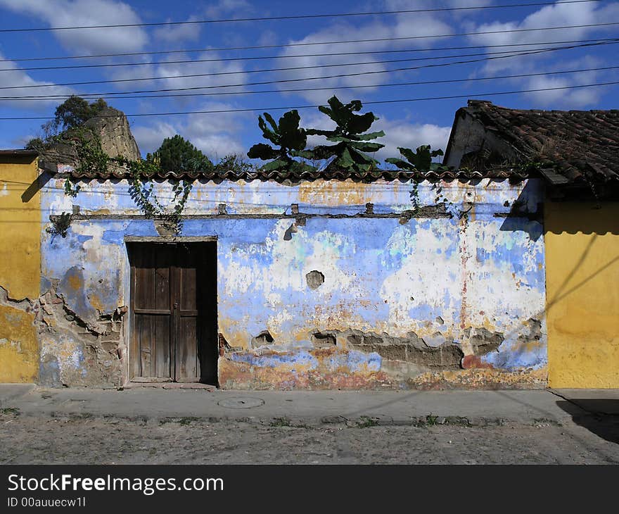 Old grungy  blue building antigua. Old grungy  blue building antigua