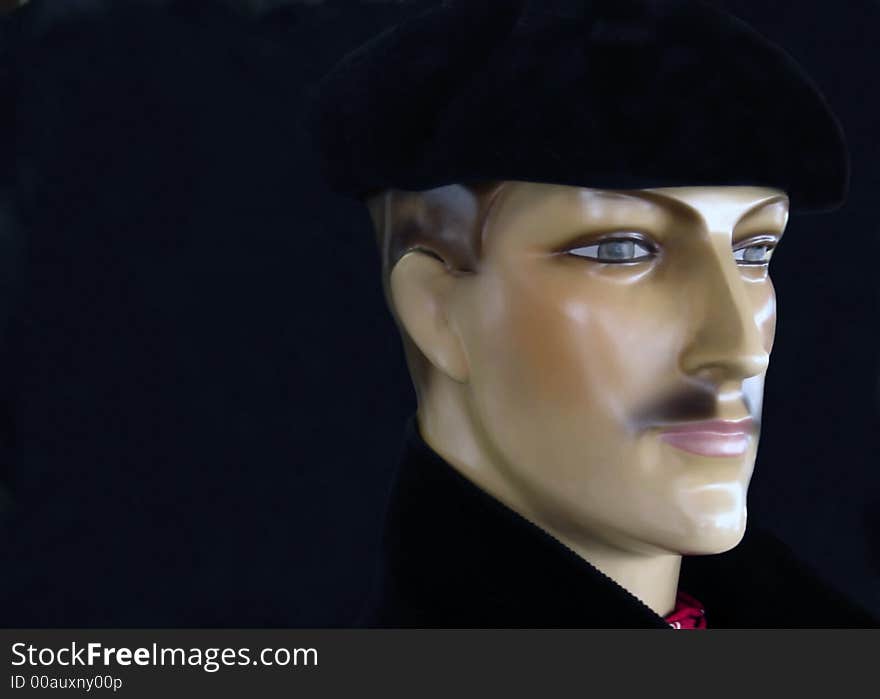 A head of a man with a black beret a french classic. A head of a man with a black beret a french classic