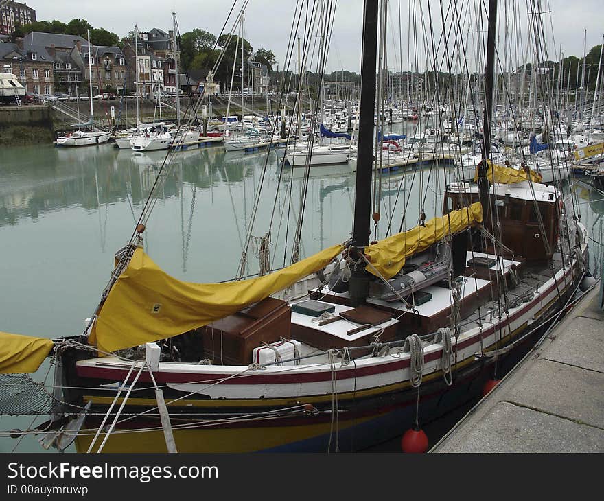 In the small city of st valery en caux in normandy a old style fishing vessel. In the small city of st valery en caux in normandy a old style fishing vessel