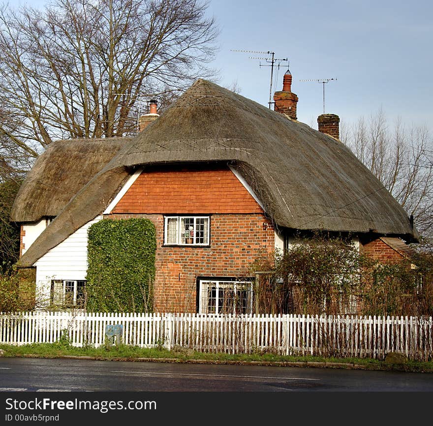 Thatched Village Cottage on a Village Street in England