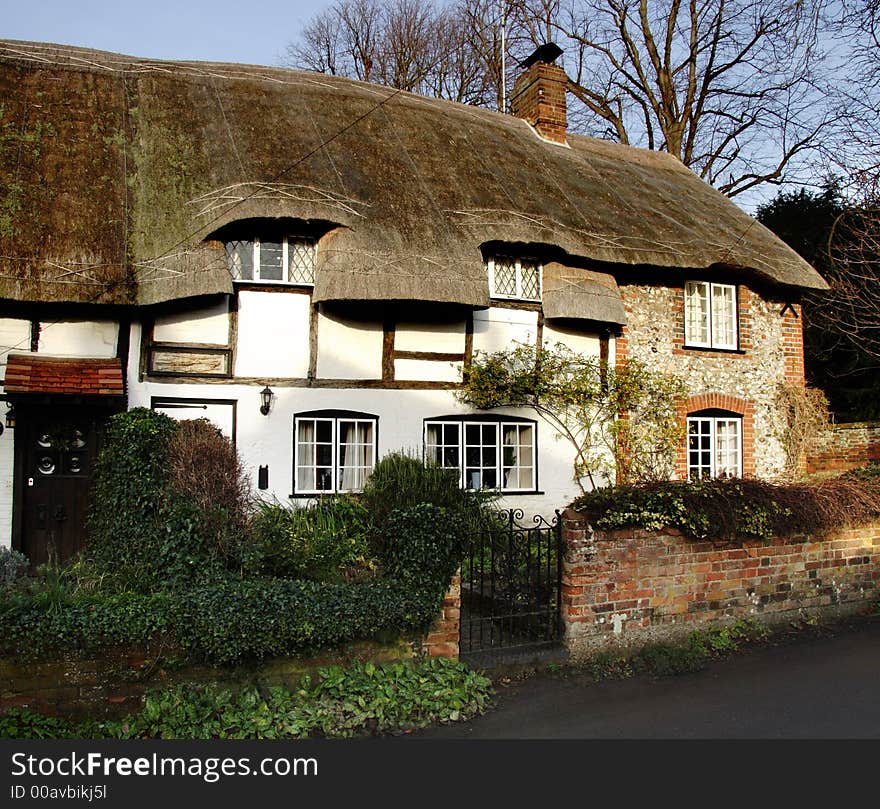 Timber Framed Thatched Village Cottages on a Village Street in England