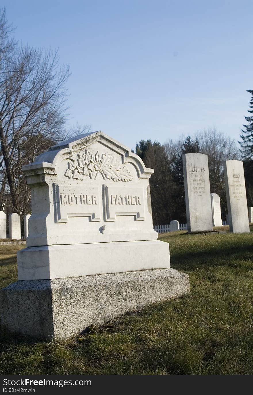 Photo of a mother and father combination grave. Photo of a mother and father combination grave.