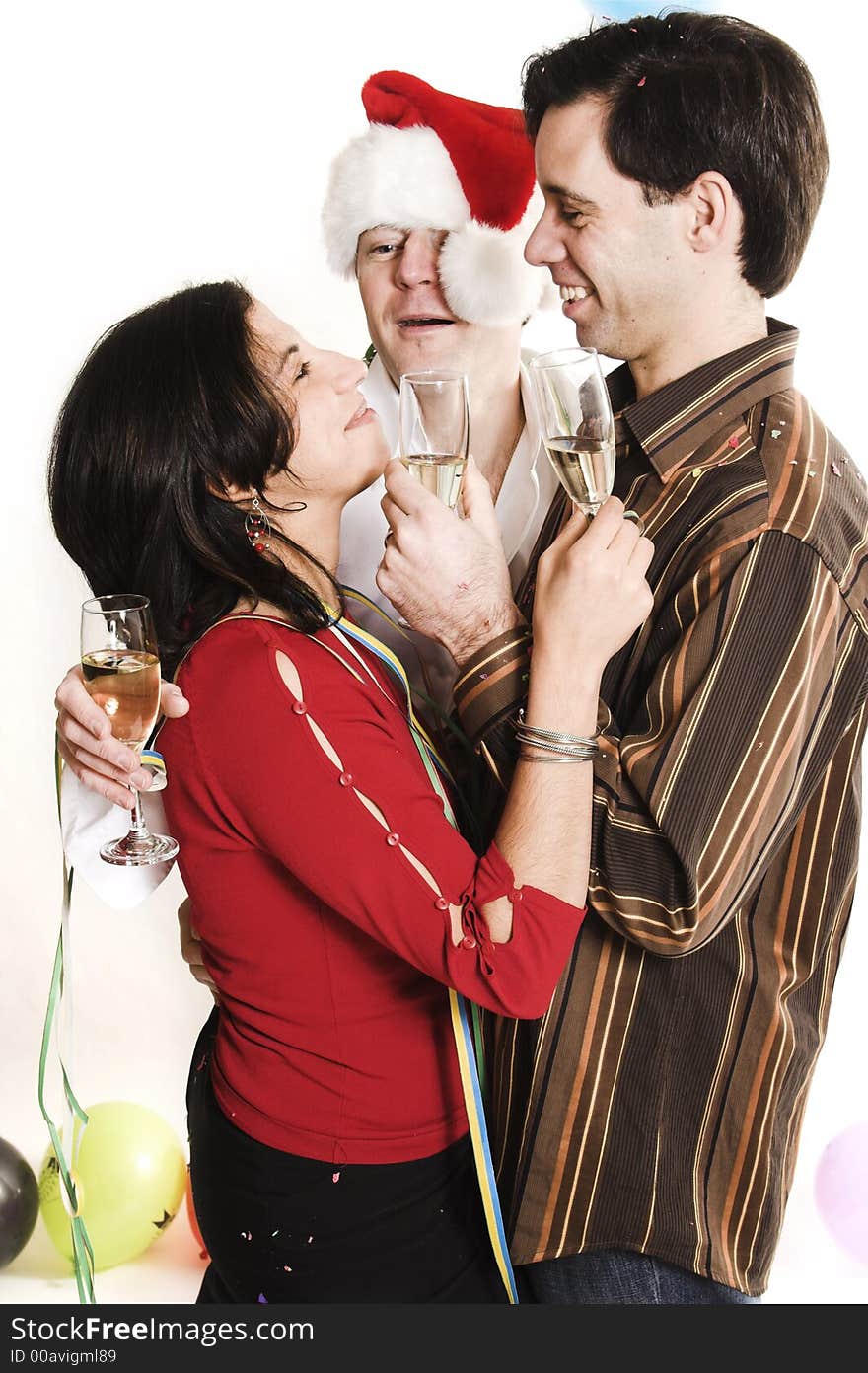 Couple celebrating with santa in white background