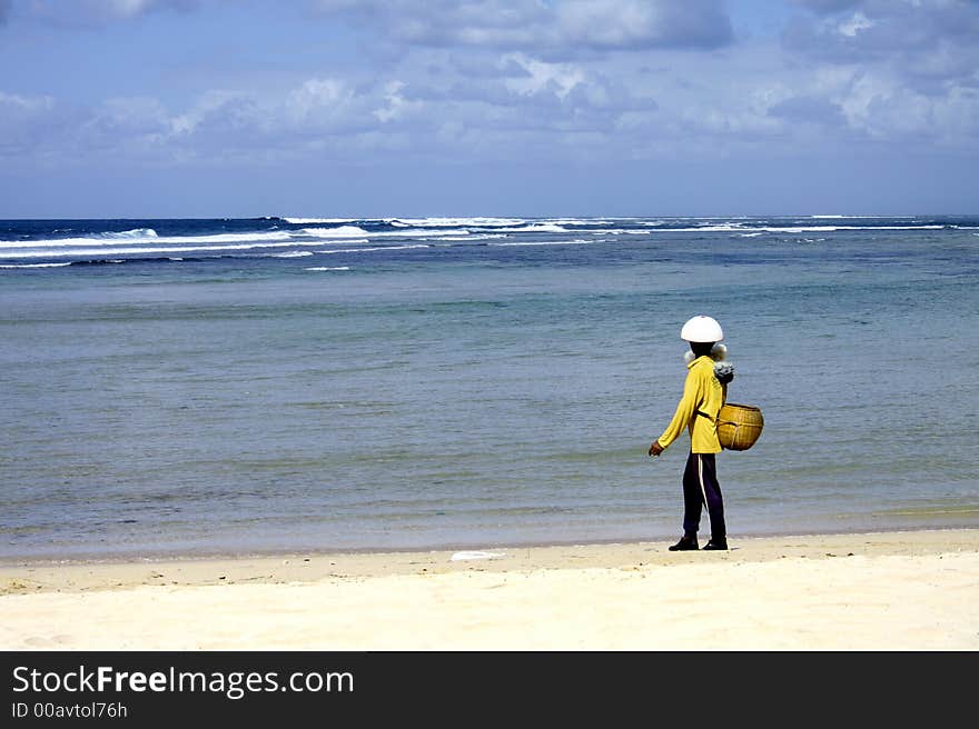 Fisherman by the sandy beach. Fisherman by the sandy beach.