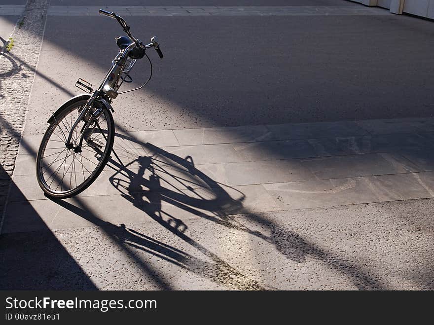 Left bicycle and the shadow