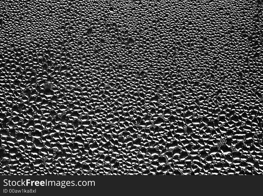 Drops of water on the glass [greyscale]. Drops of water on the glass [greyscale]