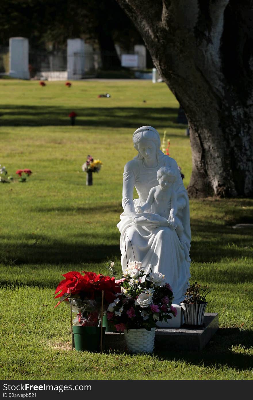 Madonna and child cemetery figures