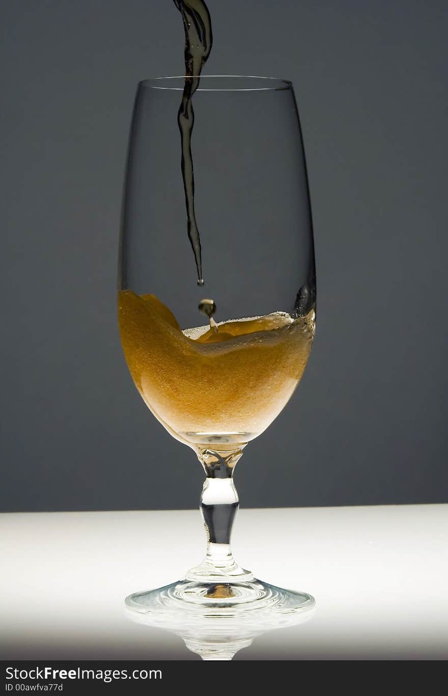 Beer being poured into a glass. Beer being poured into a glass