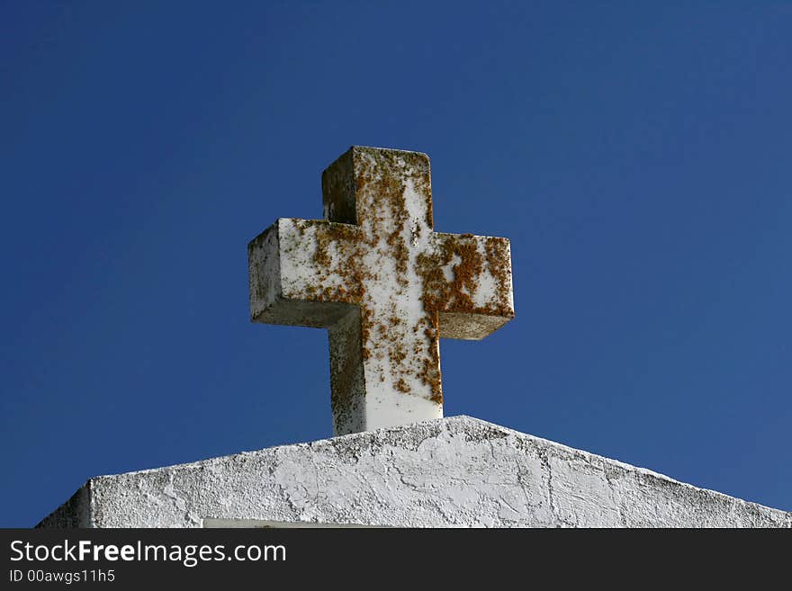 Cross on top of a tomb. Cross on top of a tomb