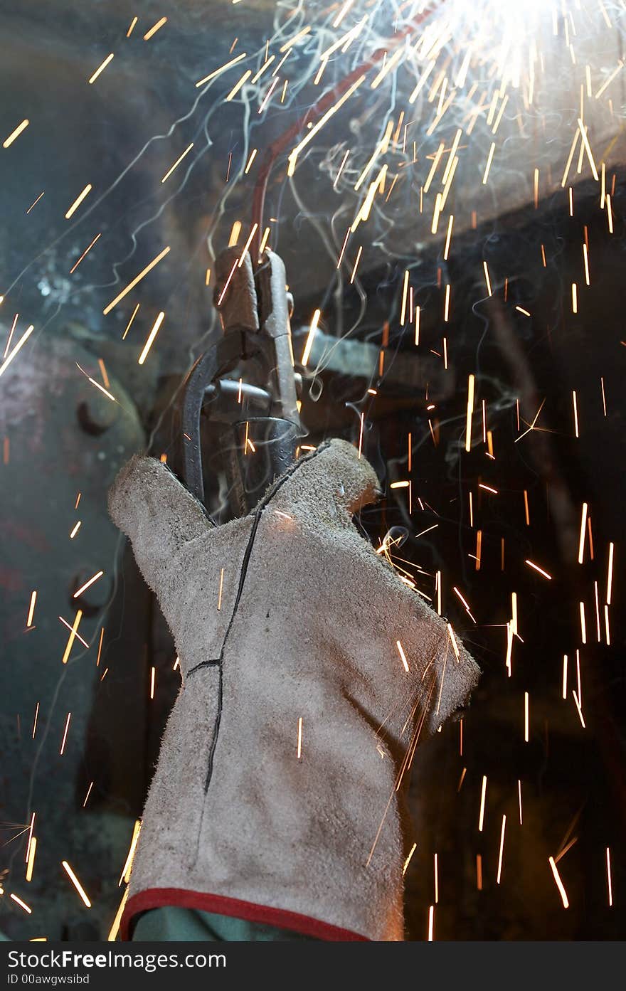 Welder working view close up of hand. Welder working view close up of hand