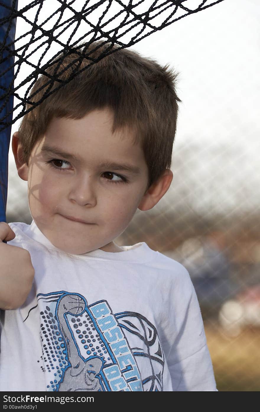 Young boy looking to the side