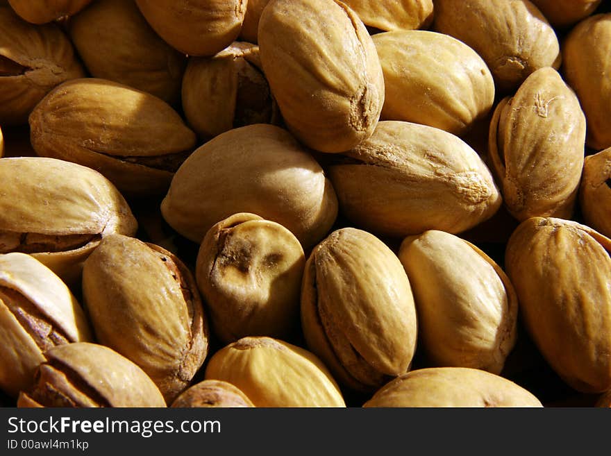 Pistachio nuts close up, salted