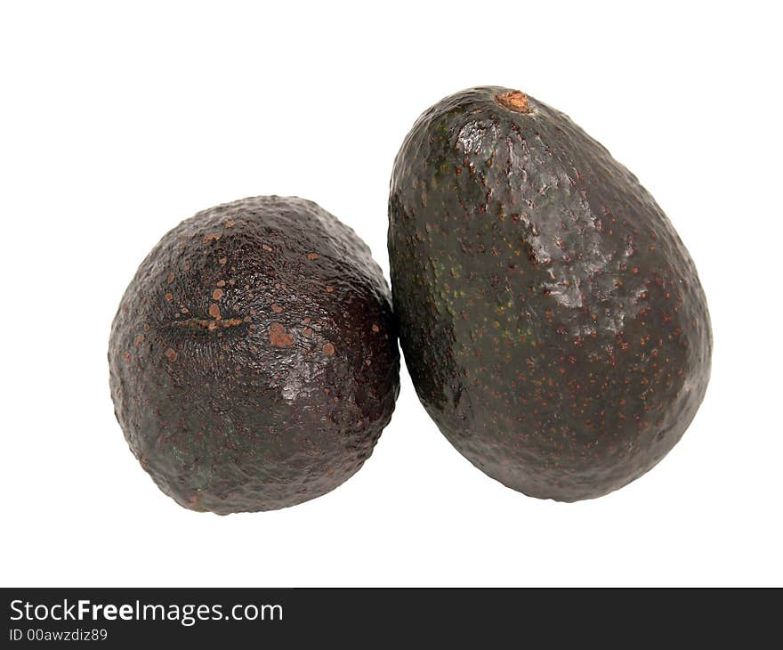 Macro view of two ripe avocado pears