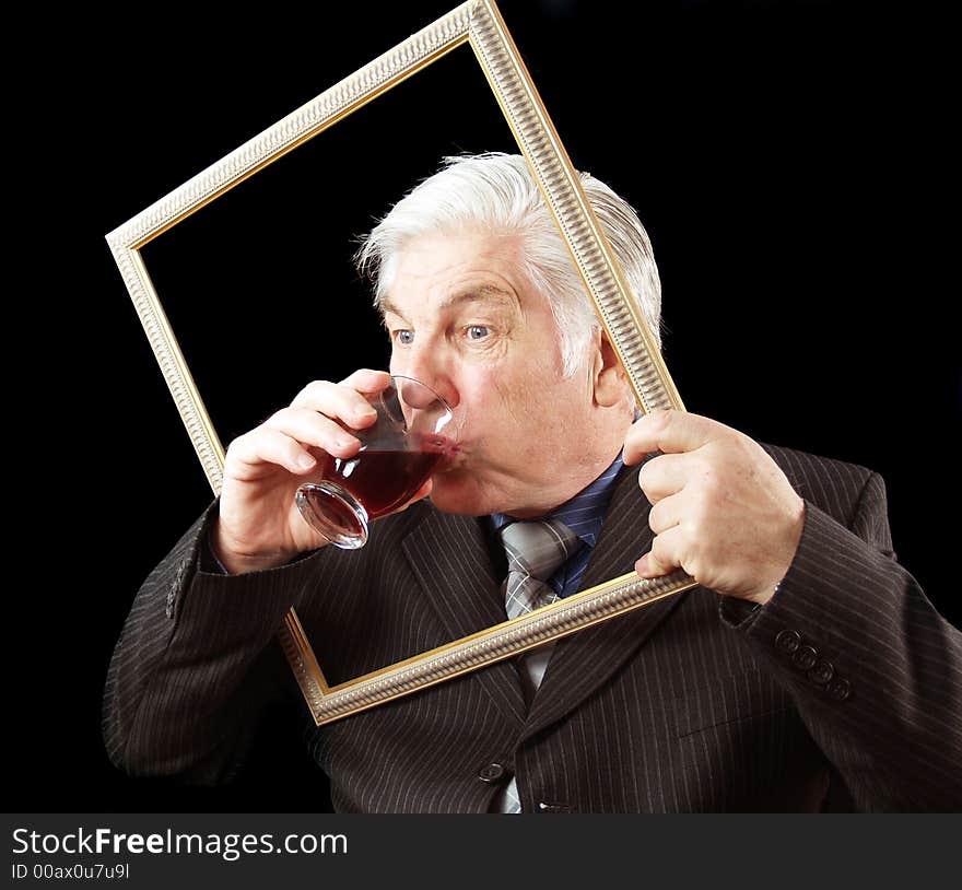 Businessman taking a quick drink breaking the frame. Businessman taking a quick drink breaking the frame