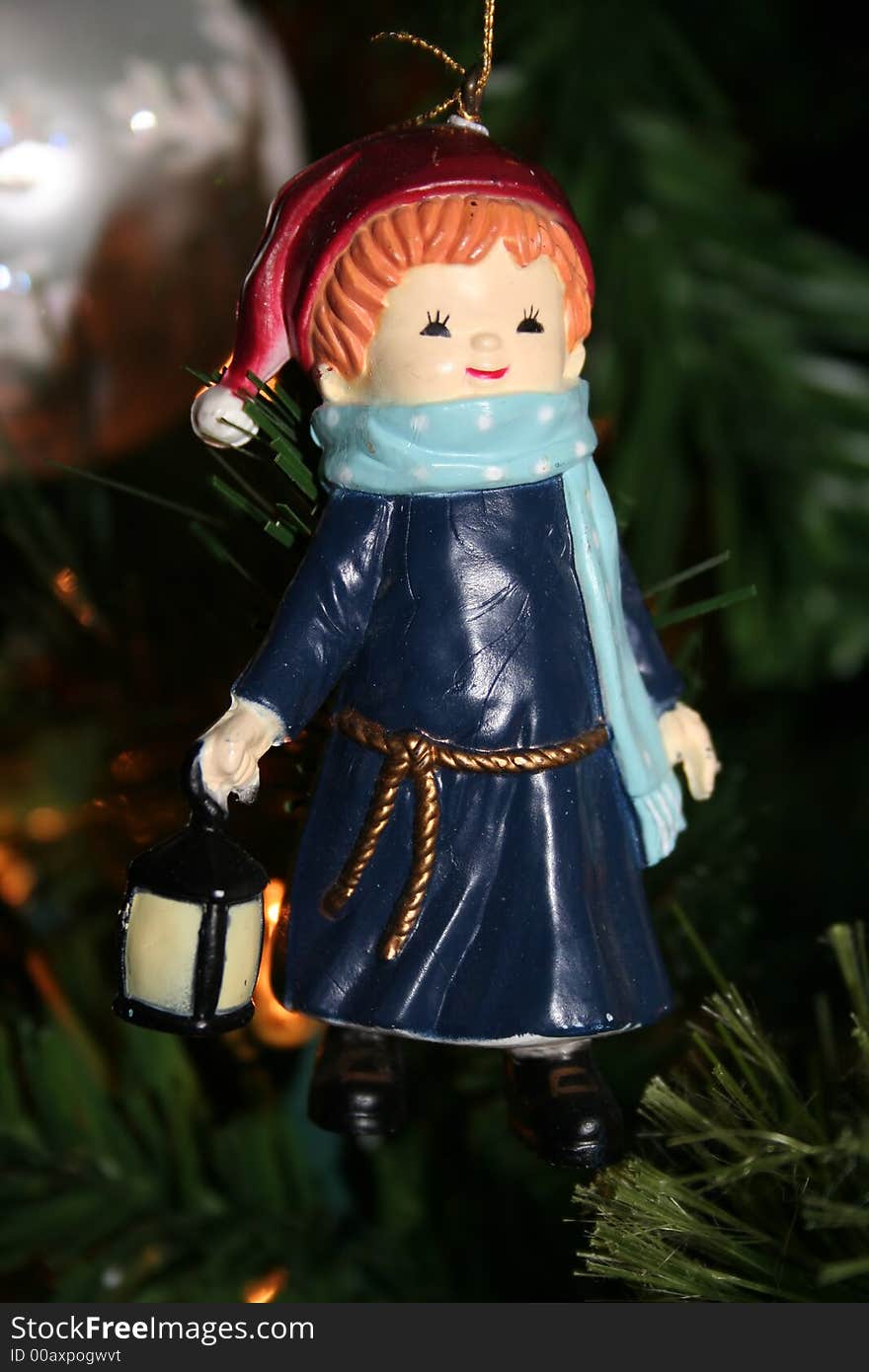 A cute little girl caroler Christmas ornament. A cute little girl caroler Christmas ornament.