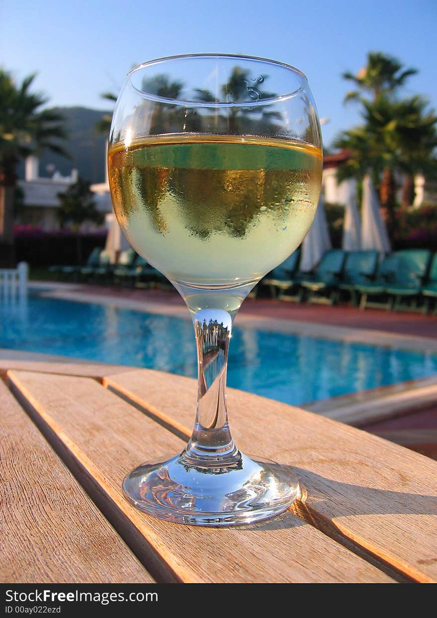 Goblet with wine on table