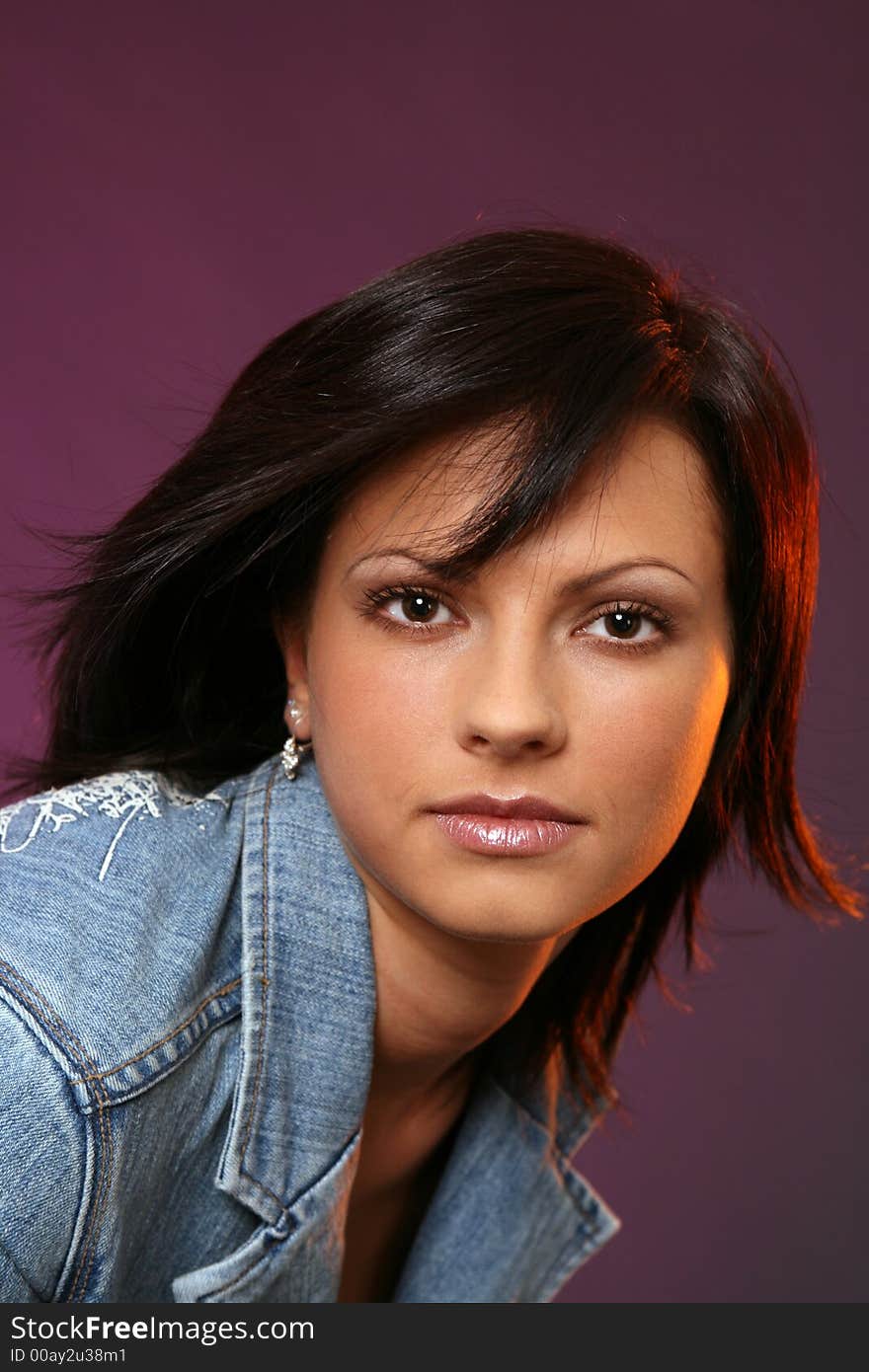 Beautiful girl in denim jacket looking at you. Beautiful girl in denim jacket looking at you