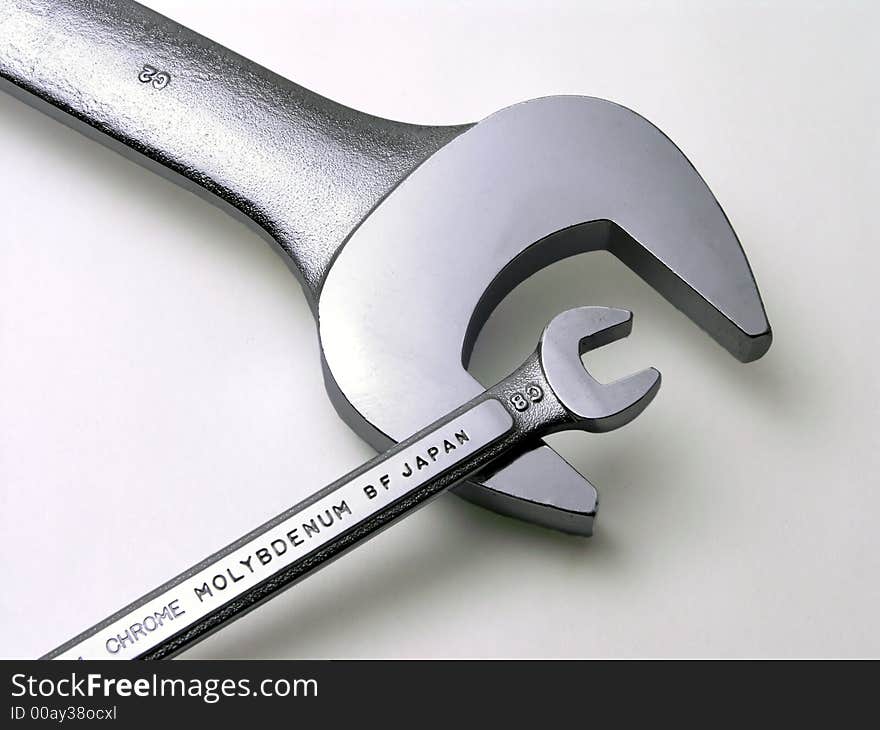 2 Wrenches - large and small. 2 Wrenches - large and small