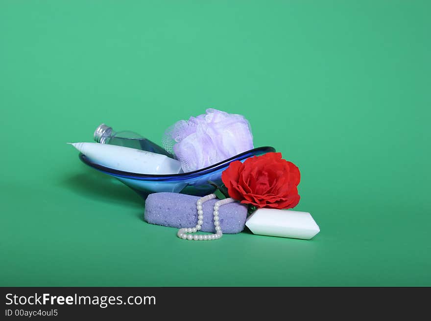 Bath items and red rose on green chroma key background. Bath items and red rose on green chroma key background