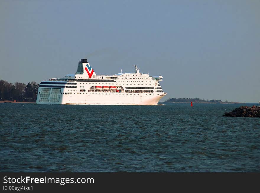 A passenger cruiser going out onto the sea