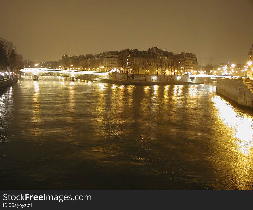 The Senne river lighted in the night. The Senne river lighted in the night