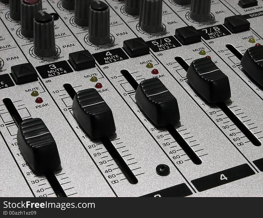 Mixing board for audio recording. Mixing board for audio recording.