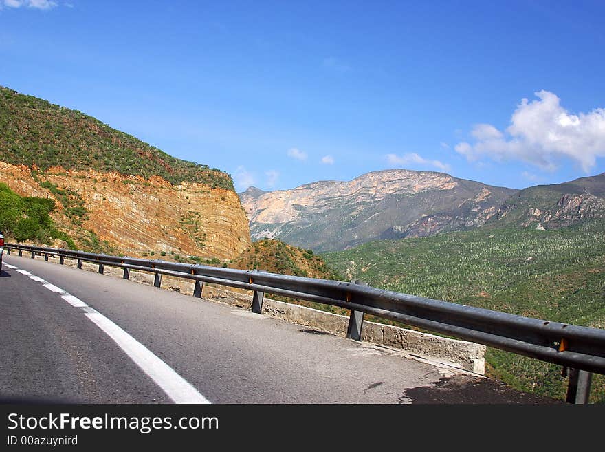 Mountains and cactus to watch on the road from Puebla to Oaxaca in the southern state of Oaxaca Mexico,Latin America