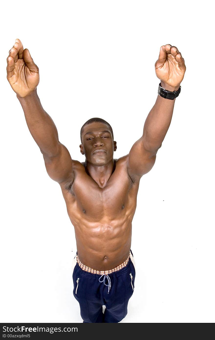 Muscular african american Athelete reaching up with close eyes. Muscular african american Athelete reaching up with close eyes