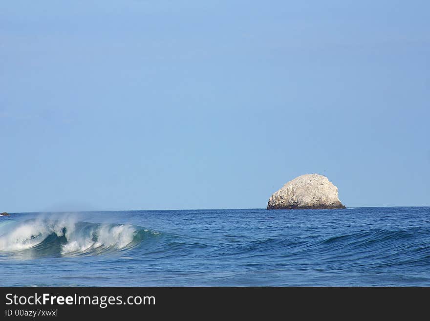 Partial view of the bay of San Agustinillo in the southern state of Oaxaca in Mexico, Latinamerica. Partial view of the bay of San Agustinillo in the southern state of Oaxaca in Mexico, Latinamerica