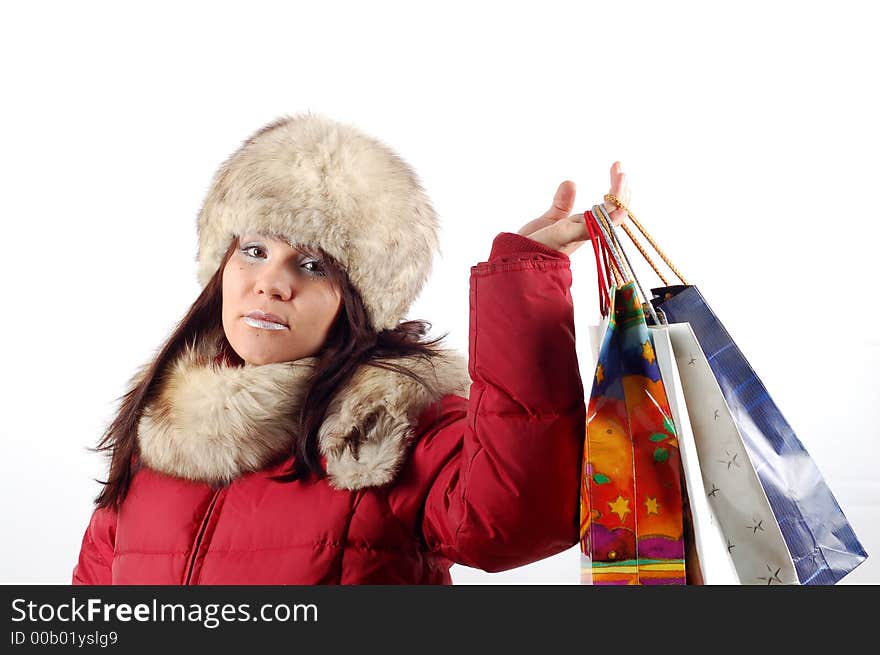 Attractive woman with shopping bags on white background. Attractive woman with shopping bags on white background