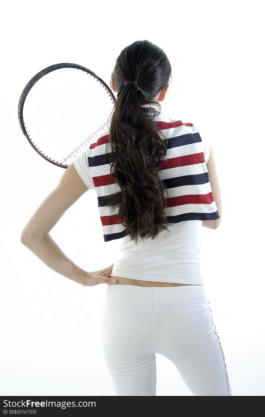 Studio portrait of a asian girl with a tennis racket. Studio portrait of a asian girl with a tennis racket