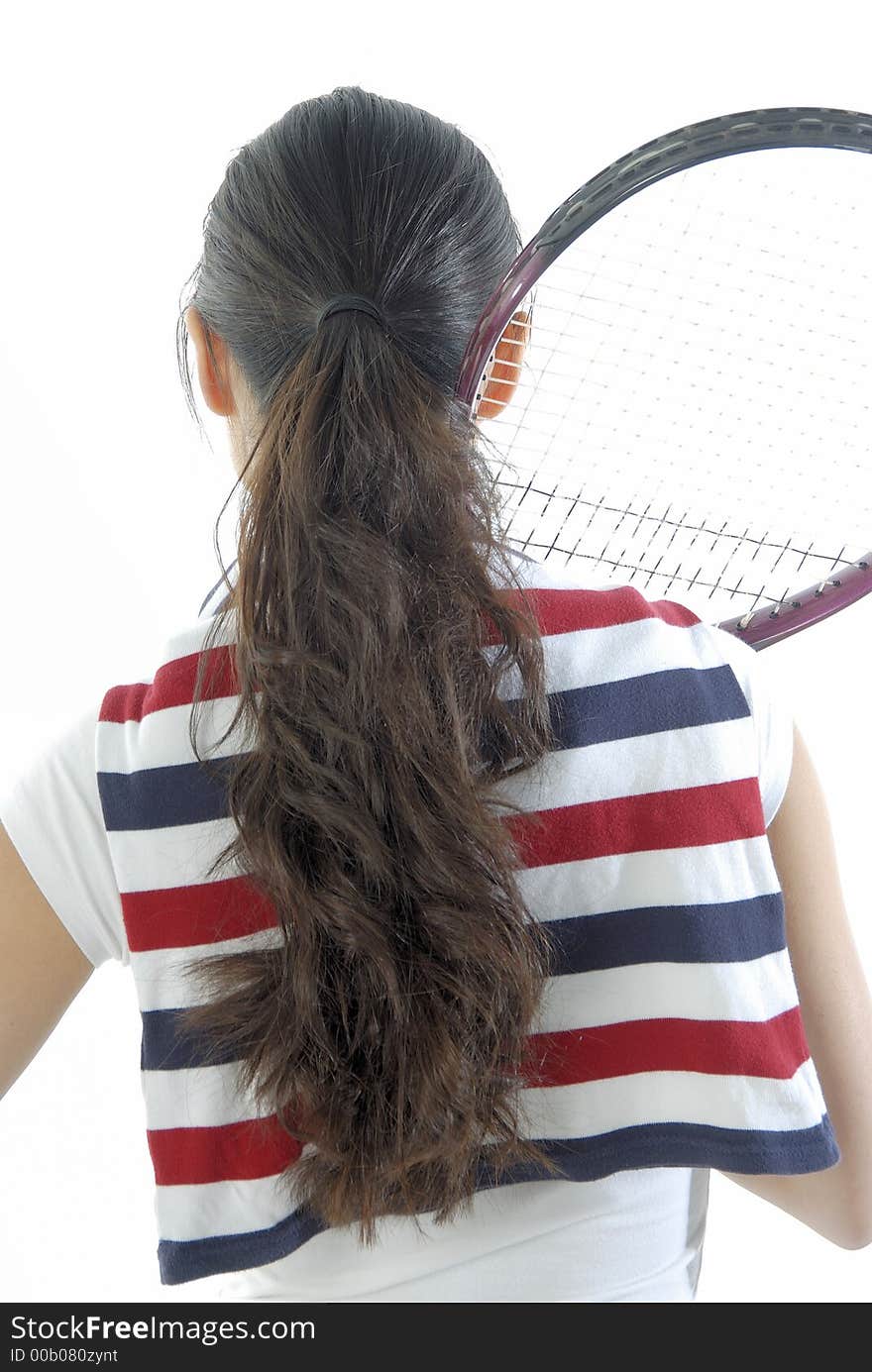 Studio portrait of a asian girl with a tennis racket. Studio portrait of a asian girl with a tennis racket