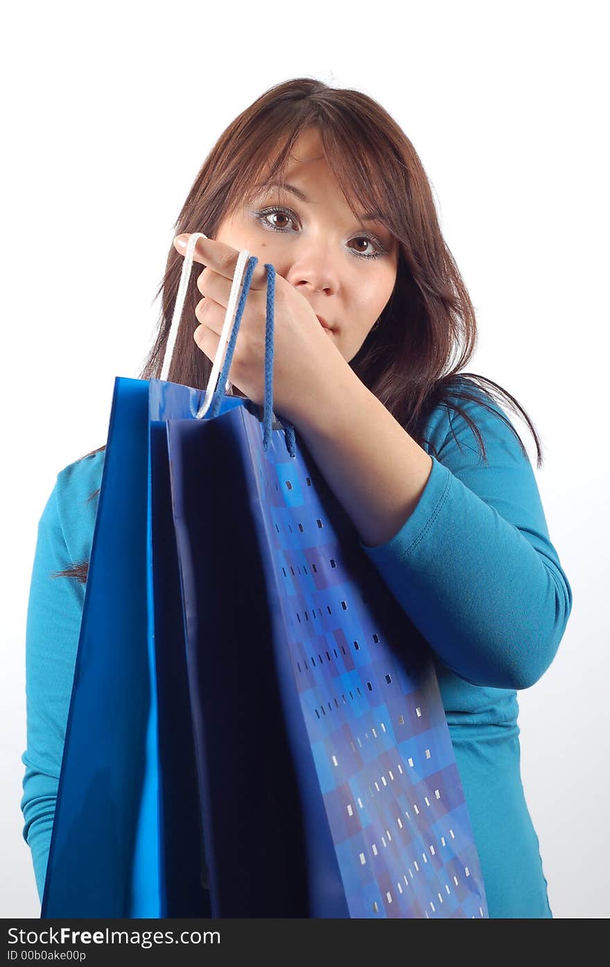 Attractive woman with shopping bags on white background. Attractive woman with shopping bags on white background