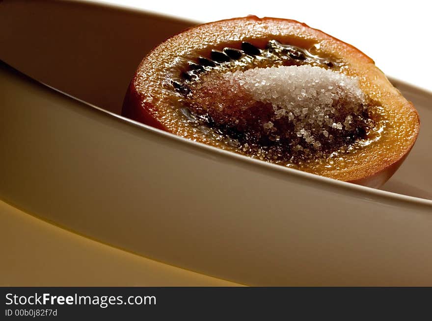 Tropical fruit tamarillo with brown sugar, isolated on white