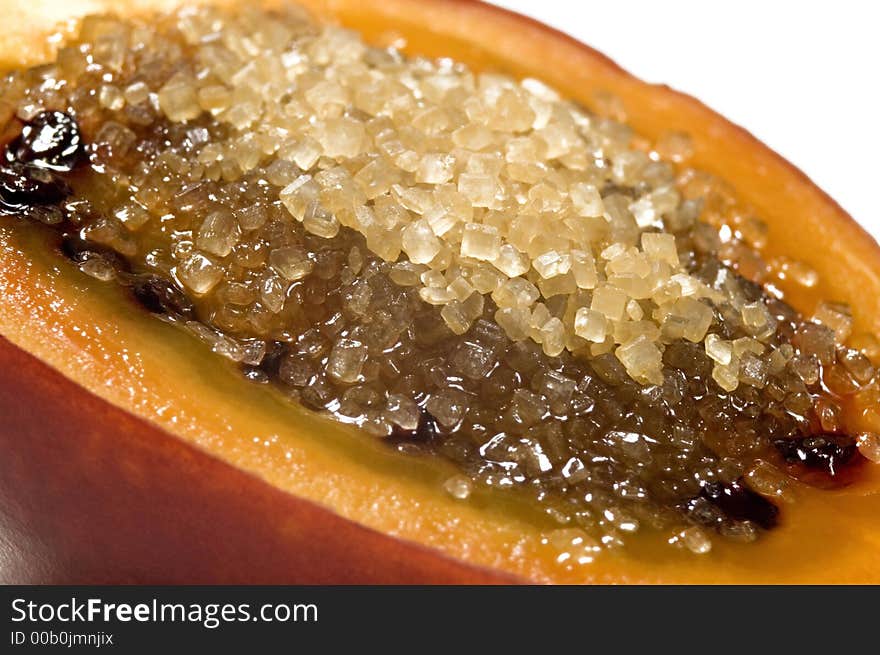 Tropical fruit tamarillo with brown sugar, isolated on white