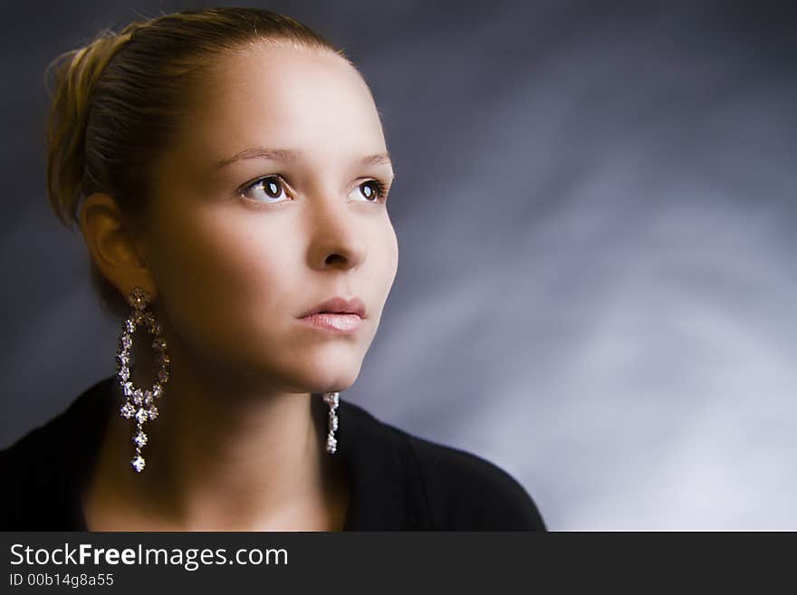 Model looking forward in the studio. Model looking forward in the studio