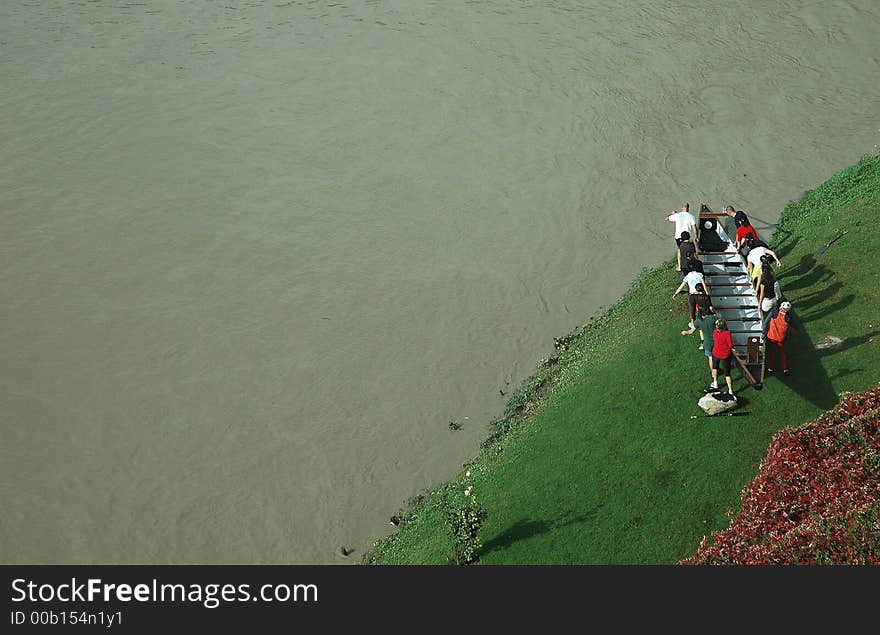 Somepeople try to descent into the arno river in florence. Somepeople try to descent into the arno river in florence