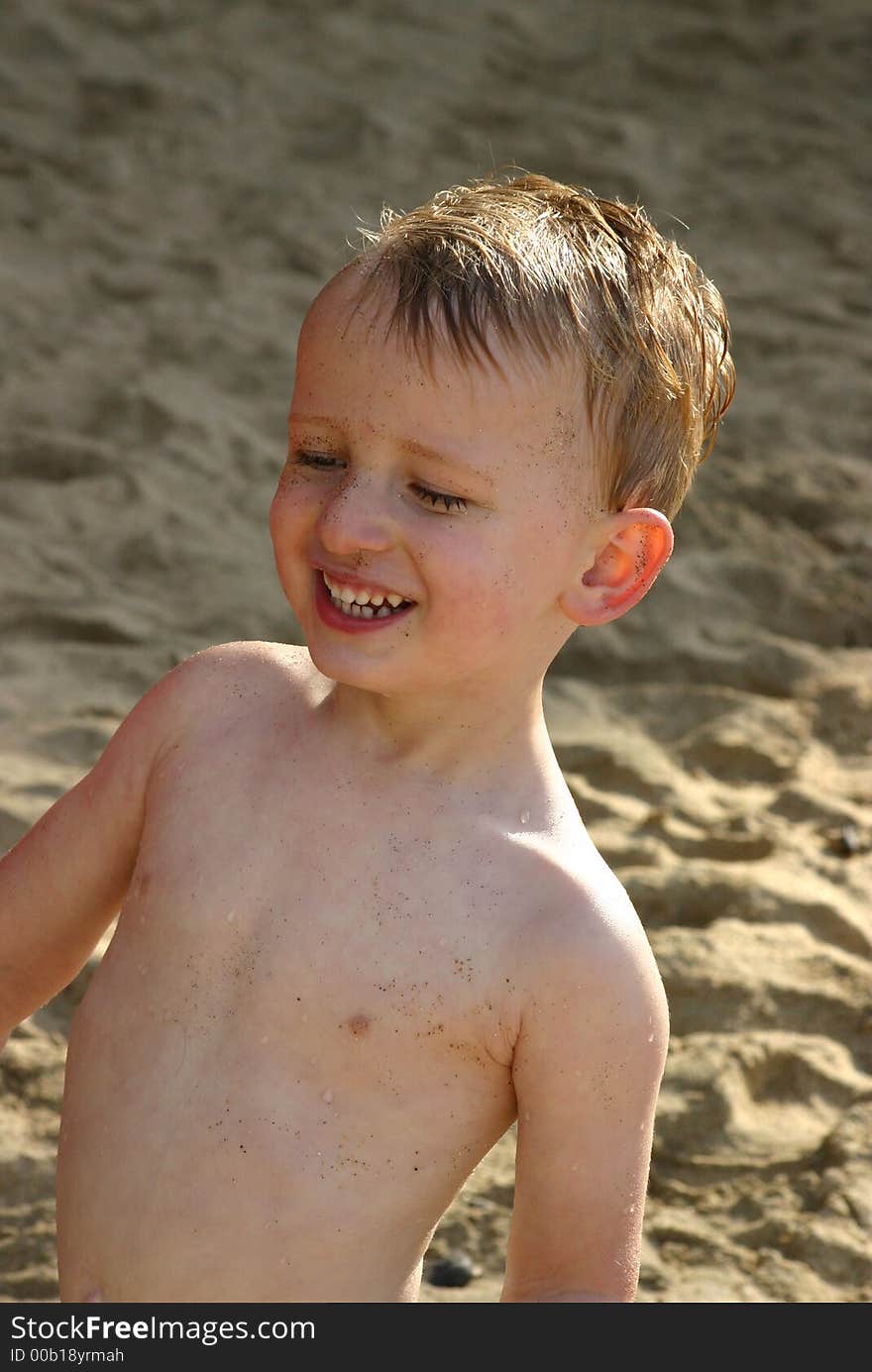 Portrait of a toddler boy enjoying a day on the beach. Portrait of a toddler boy enjoying a day on the beach