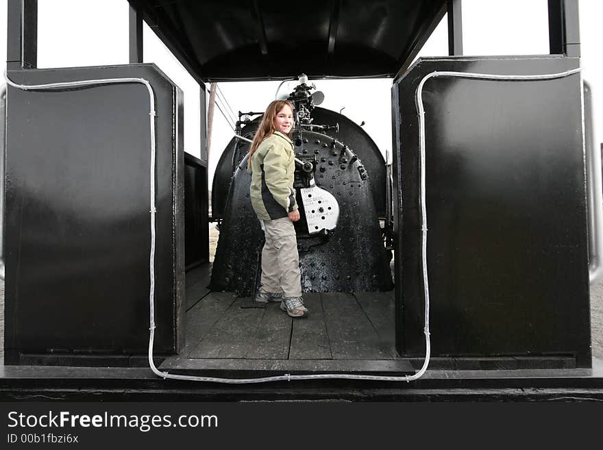 Young lady operating a big train