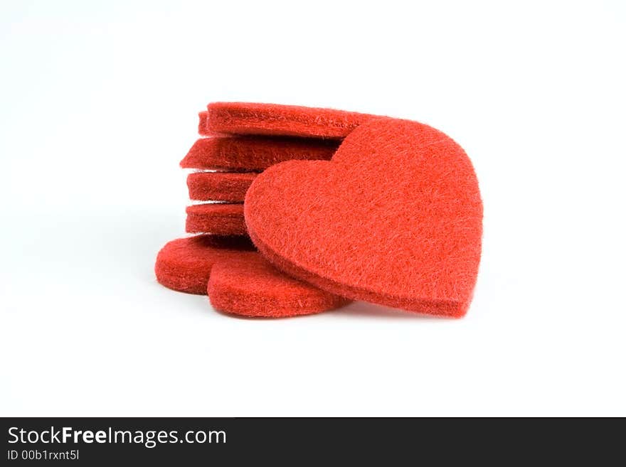 Six red felt hearts in a stack. Six red felt hearts in a stack