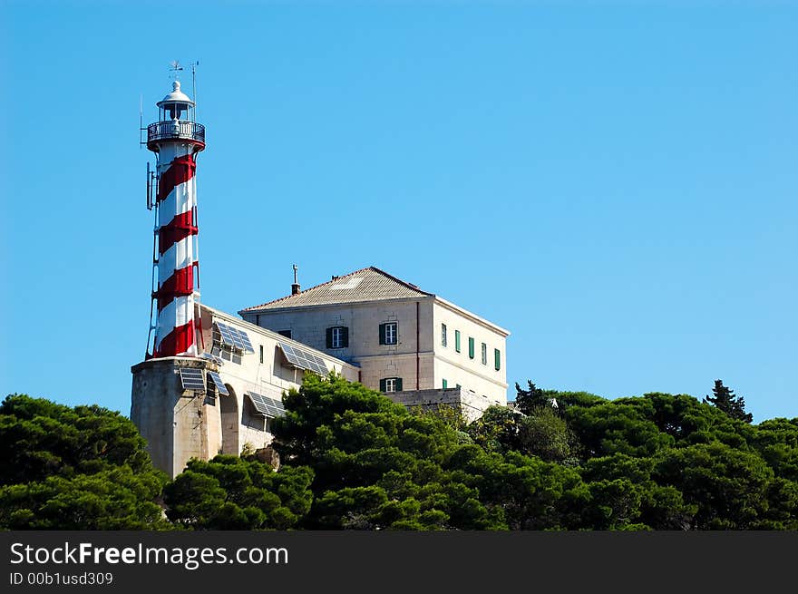 Lighthouse Blitvenica situated on small Croatian island. Lighthouse Blitvenica situated on small Croatian island.