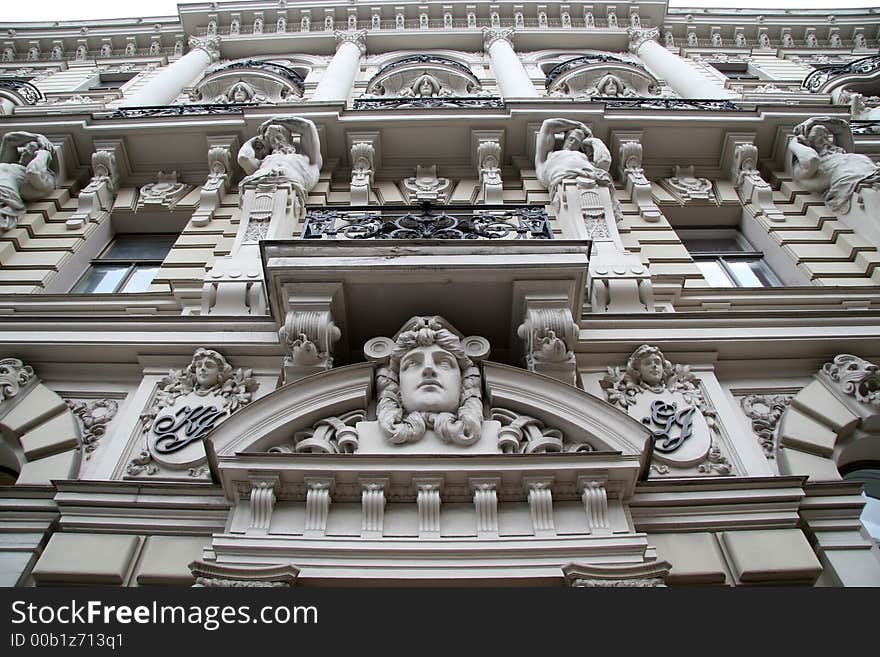 Art nouveau house with human sculptures and relief