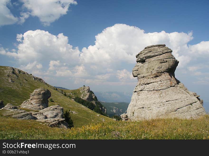 Mountain landscape on a background of the dark blue sky. Mountain landscape on a background of the dark blue sky