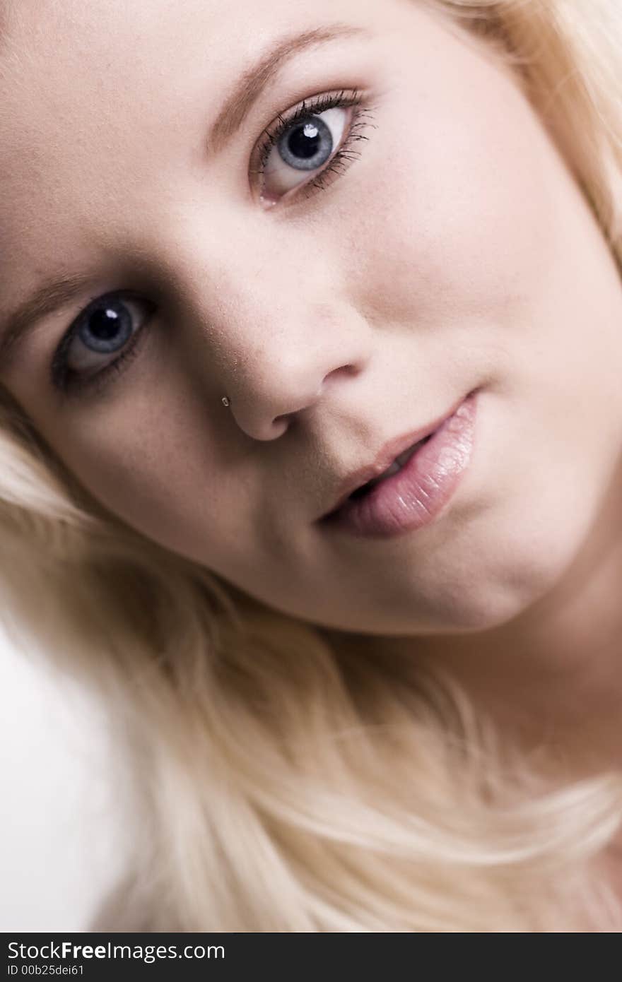 A model portrait on a white background. A model portrait on a white background