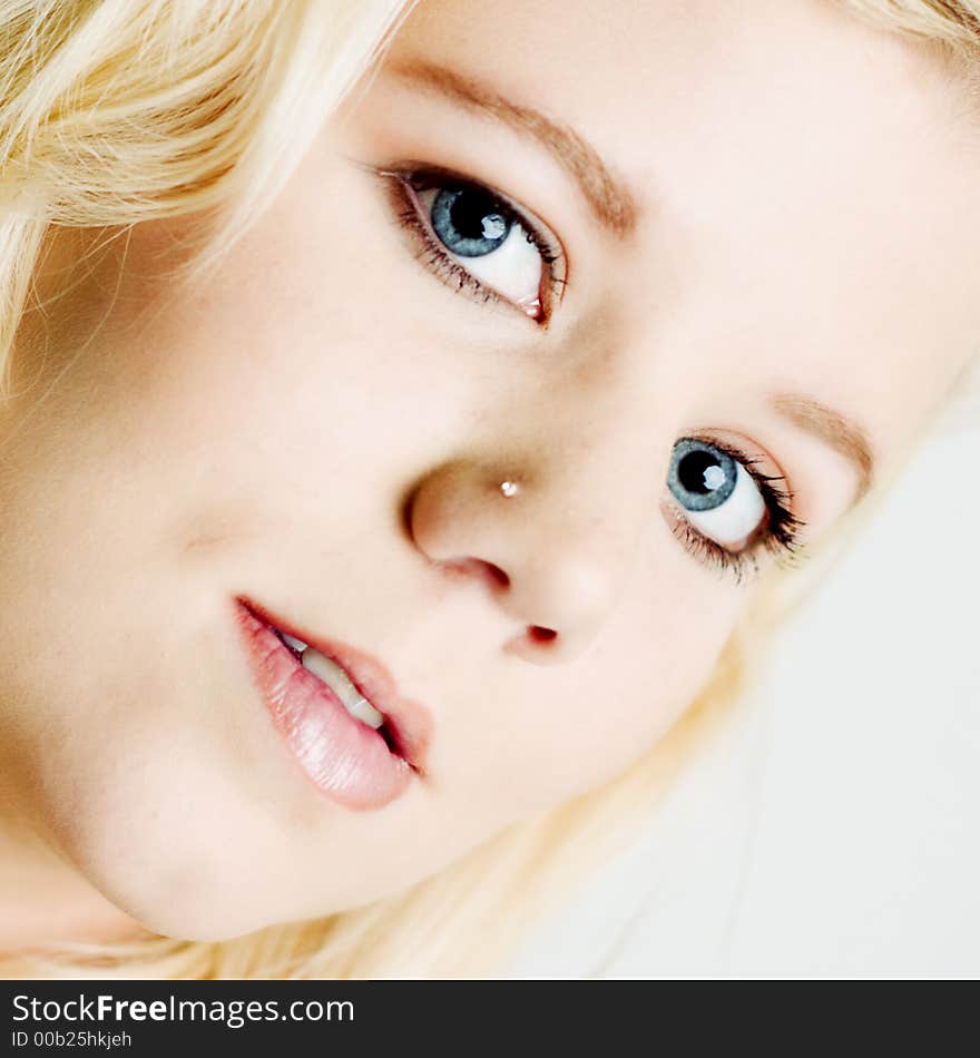 A model portrait on a white background. A model portrait on a white background