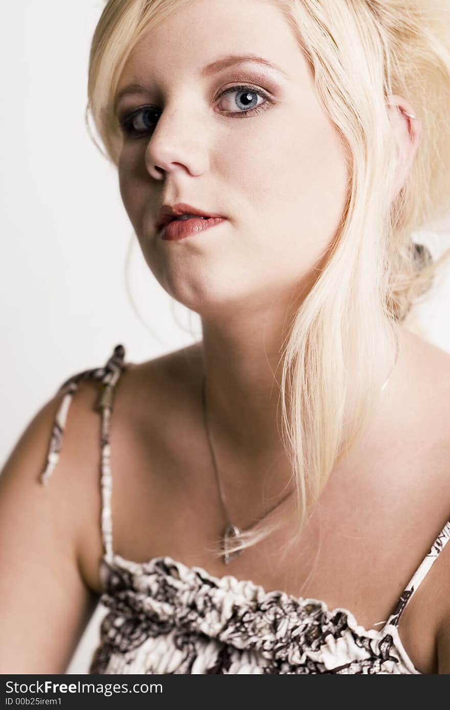 A model portrait on a white background. A model portrait on a white background